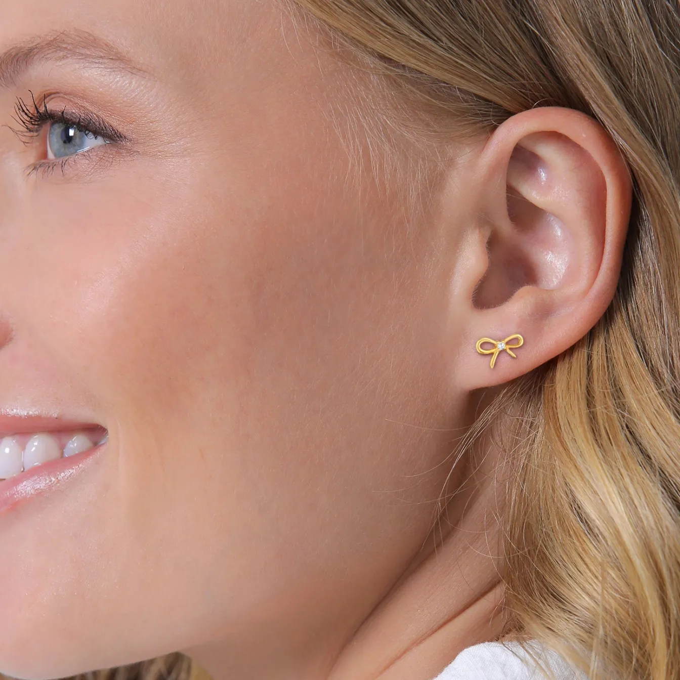 Elli "Ohrstecker Schleife | Zirkonia (Weiß)< Vergoldet|Symbol-schmuck